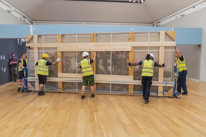  A group of workers return Singer Sargent's canvas to the Imperial War Museum after its restoration, on July 19, 2023. 