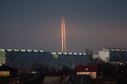 Three rockets launched against Ukraine from Russia's Belgorod region are seen at dawn in Kharkiv, Ukraine, on March 9, 2023.