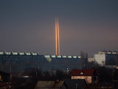 Three rockets launched against Ukraine from Russia's Belgorod region are seen at dawn in Kharkiv, Ukraine, on March 9, 2023.