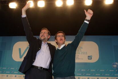 Rajoy y Feijóo, ayer en la clausura de la convención que el PP celebró en Santiago.