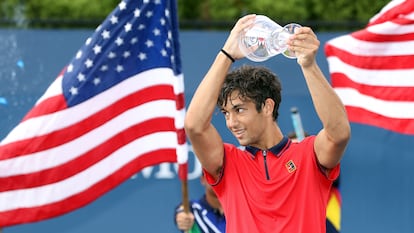 NEW YORK, NEW YORK - SEPTEMBER 11: Daniel Rincon of Spain celebrates with the championship trophy after defeating Juncheng Shang of China during their Boys' Singles final match on Day Thirteen of the 2021 US Open at the USTA Billie Jean King National Tennis Center on September 11, 2021 in the Flushing neighborhood of the Queens borough of New York City. Matthew Stockman/Getty Images/AFP
== FOR NEWSPAPERS, INTERNET, TELCOS & TELEVISION USE ONLY ==