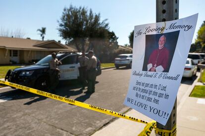 Los Angeles County Sheriff deputies guard the entrance to the street of Bishop David O'Connell's home in Hacienda Heights, Calif., Sunday, Feb. 19, 2023.