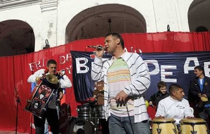 Members of prison rock band formed by 'Vatayón Militante' play at a recent government rally.