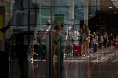 Passengers arriving at Barcelona's El Prat airport on Monday.