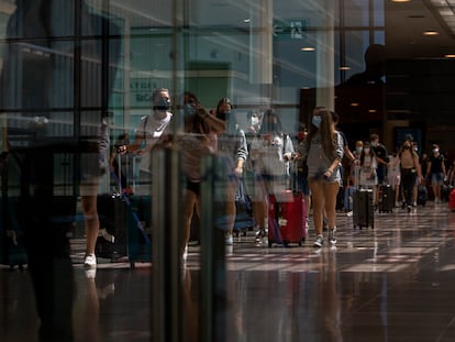 Passengers arriving at Barcelona's El Prat airport on Monday.