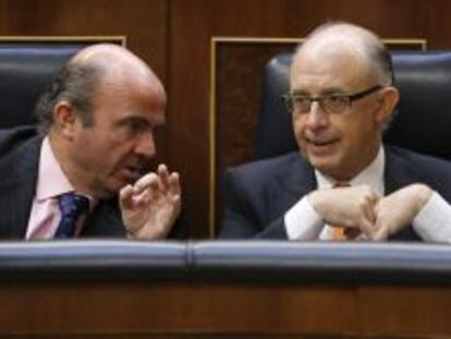 Los ministros de Econom&iacute;a y Hacienda, Luis de Guindos y Crist&oacute;bal Montoro.