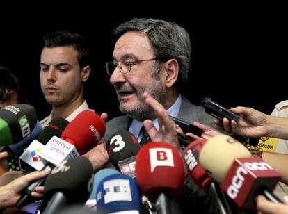 Former Caixa Catalunya chairman Narcis Serra attends to the press after a court appearance on criminal mismanagement case.
