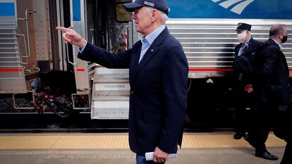 Joe Biden greets supporters after arriving at an Amtrak train for a campaign stop in Alliance, Ohio, on September 30, 2020.