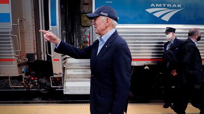 Joe Biden greets supporters after arriving at an Amtrak train for a campaign stop in Alliance, Ohio, on September 30, 2020.