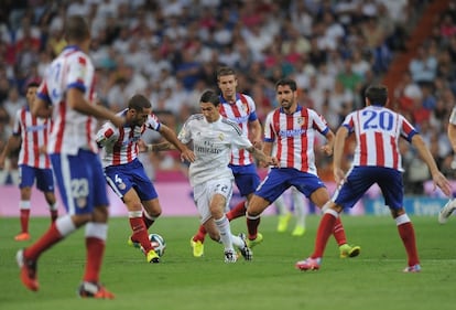 Di María, rodeado por Mario, Gabi y Raúl García.