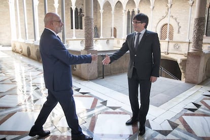 Spanish State Attorney General José Manuel Maza, left, and Catalan regional premier Carles Puigdemont.