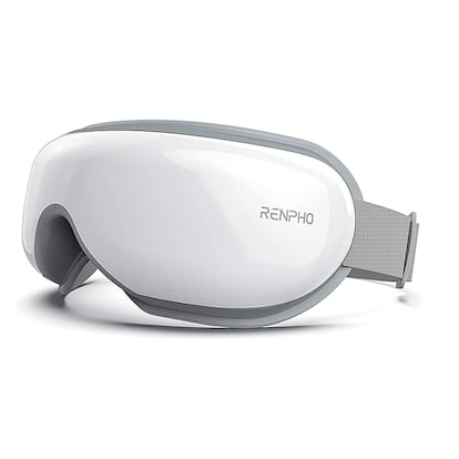 Gafas de masaje ocular sobre fondo blanco.