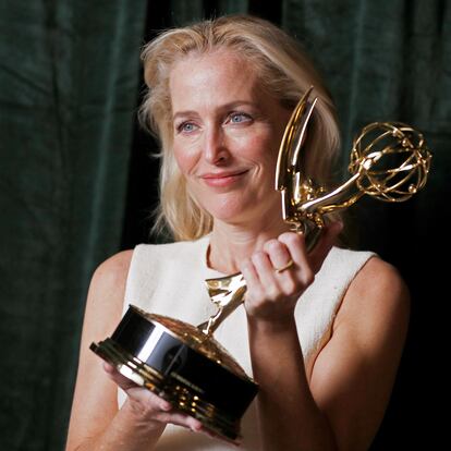 Gillian Anderson poses with her Emmy award for Outstanding Supporting Actress in a Drama Series, backstage at the Netflix UK Primetime Emmy for "The Crown", in London, Britain, September 20, 2021. REUTERS/Peter Nicholls