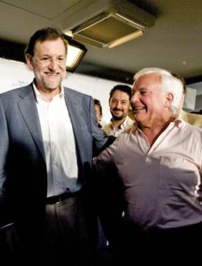 Rajoy, junto a Baltar en un acto en octubre.