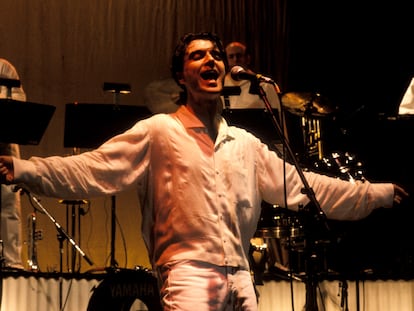 David Byrne Latin Band performs on stage, 1990.