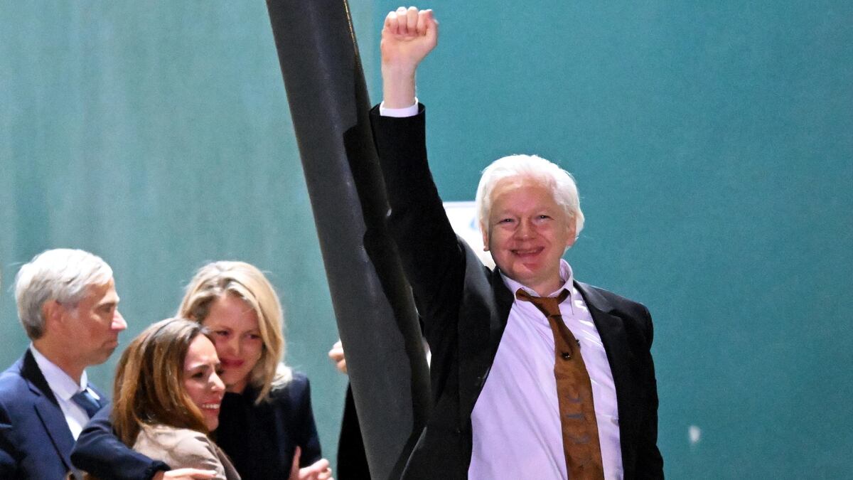 Julian Assange returns to Europe in his first public intervention since his release in June