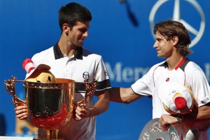 Novak Djokovic, ganador en Pekín, junto a David Ferrer.