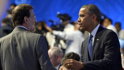 Prime Minister Mariano Rajoy greets President Barack Obama on Tuesday in Los Cabos, Mexico.