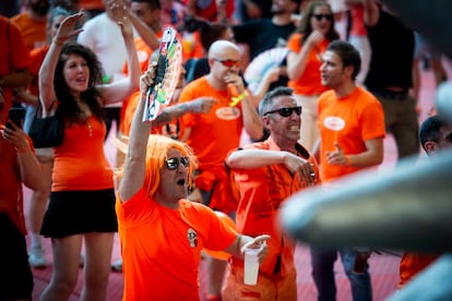 Radical orange party attendees on the cover of Leganés, Madrid. 