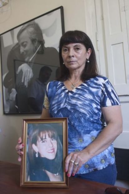 Susana Trimarco poses with a photo of her daughter, Marita Verón.