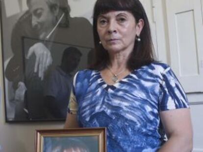 Susana Trimarco poses with a photo of her daughter, Marita Verón.