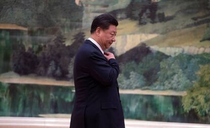 Xi Jinping participa en una reunión en el Gran Palacio del Pueblo en Pekín, este viernes.