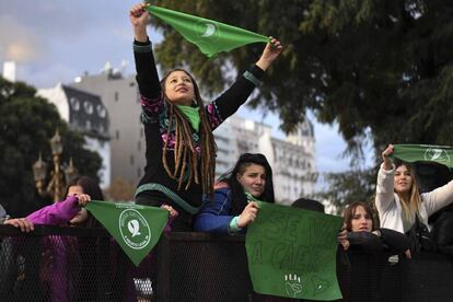 Demonstrators protest outside Congress.