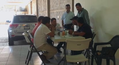 Screen capture from video showing La Tuta in a meeting with a former mayor and other Michoac&aacute;n officials.