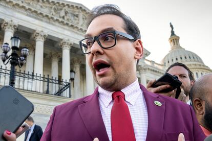 Rep. George Santos, R-N.Y., speaks to reporters outside the Capitol, in Washington