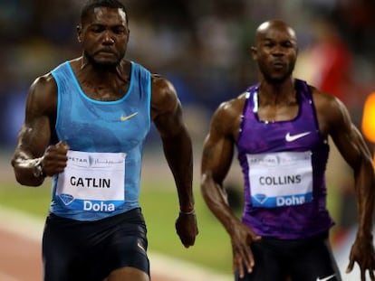 Gatlin, a la izquierda, por delante de Kim Collins, en la reunión de Doha.