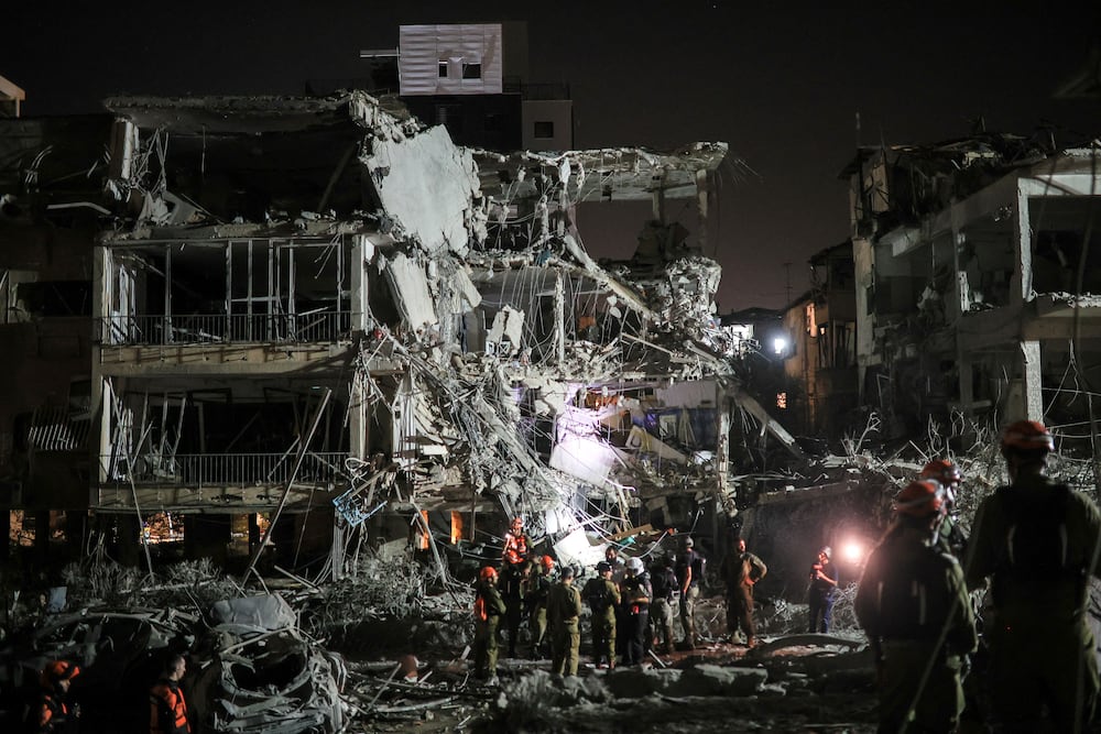 Rescue and security personnel work at an impact site following missile attack from Iran on Israel, in  Ramat Gan, Israel  June 13, 2025 REUTERS/Itai Ron 

ISRAEL OUT. NO COMMERCIAL OR EDITORIAL SALES IN ISRAEL