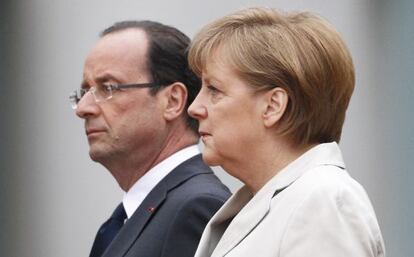 French president Fran&ccedil;ois Hollande and German Chancellor Angela Merkel together at their first official meeting last month.
