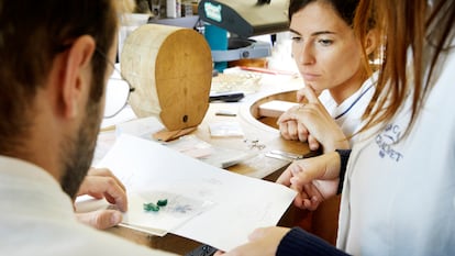 Jewelers from Chaumet examine a design to use a three-leaf clover-shaped diamond originally gifted by Napoleon III to Empress Eugenie.