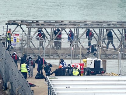 A group of people thought to be migrants are brought in to Dover, Kent, onboard a Border Force vessel following a small boat incident in the Channel, England, Monday March 6, 2023.