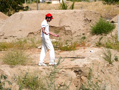 A cricket player during a match on a makeshift field in Sonseca, Toledo.
