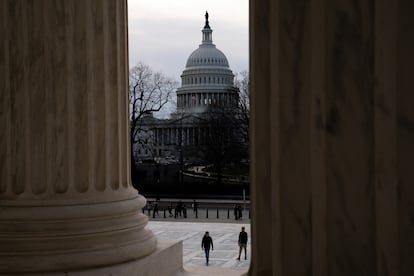 Tourists walk near the U.S. Capitol as the Senate votes to begin work on a bill that includes aid for Ukraine, Israel and Taiwan in Washington, U.S., February 9, 2024.