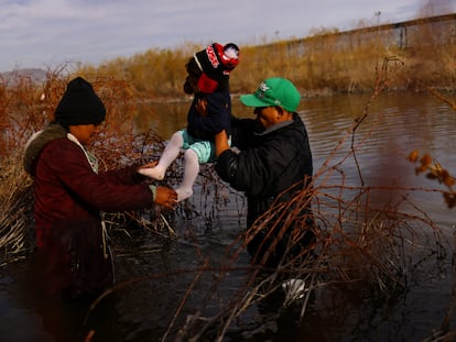 Monse, a 2-year-old Honduran migrant girl, is carried by her parents as they cross the Rio Bravo river to reach the United States and request asylum, as seen from Ciudad Juarez, Mexico February 1, 2024