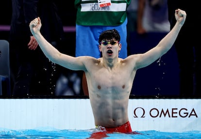 Zhanle Pan celebrates after winning the 100m freestyle and setting a new world record.