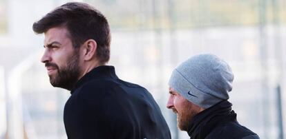 Piqu&eacute; y Messi, en el &uacute;ltimo entrenamiento del Bar&ccedil;a.