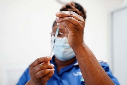 A nurse prepares a dose of a Covid-19 vaccine at the University Hospital Coventry, UK, April 22, 2022.