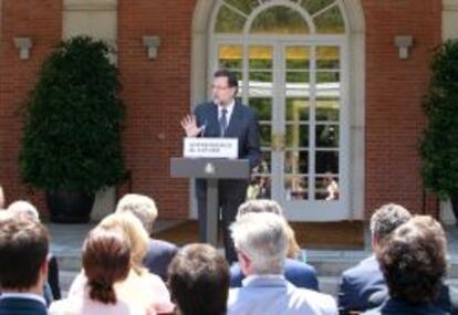 Mariano Rajoy en La Moncloa durante la presentaci&oacute;n de la Ley de Emprendedores a un grupo de empresarios.