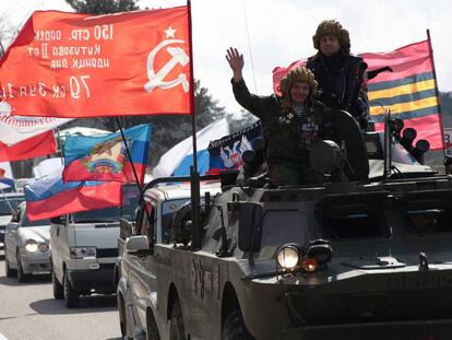 Desfile de motorizado con banderas para conmemorar el quinto aniversario de la anexión de la península de Crimea por parte de Rusia, en Sevastopol el 16 de marzo.
 