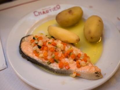 Salmon with vegetables and potatoes at the Bouillon Chartier, in Paris.