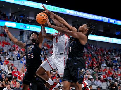 Memphis Tigers guard Damaria Franklin (55) and forward Chandler Lawson (4) and Houston Cougars guard Jamal Shead (1) battle for control of the ball during the first half at Dickies Arena on March 12, 2023.