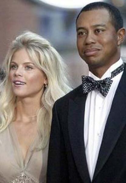 Tiger Woods, con su mujer.