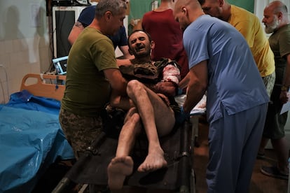 A wounded soldier arriving at a field hospital near the Zaporizhzhia front.