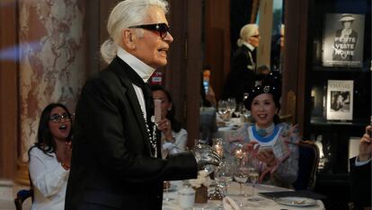 Designer Karl Lagerfeld appears at the end of his Metiers D&#8217;Art Show for Chanel fashion house in Paris
