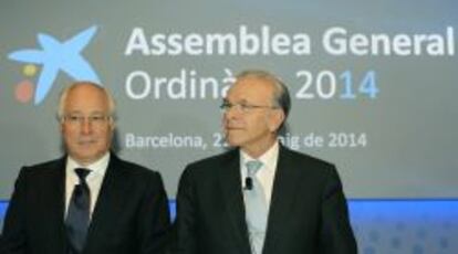 El presidente y el vicepresidente y Consejero Delegado del Consejo de Administración de la Caixa, Isidro Fainé Casas (d) y Juan María Nin Génova(i), respectivamente, al inicio de la asamblea general extraordinaria de la Caixa