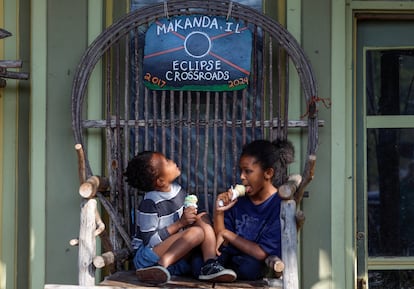 Kids eat ice cream in Makanda, population 600, which is at the crossroads of the 2017 and 2024 eclipses,  on Sunday.