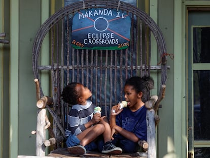 Kids eat ice cream in Makanda, population 600, which is at the crossroads of the 2017 and 2024 eclipses,  on Sunday.